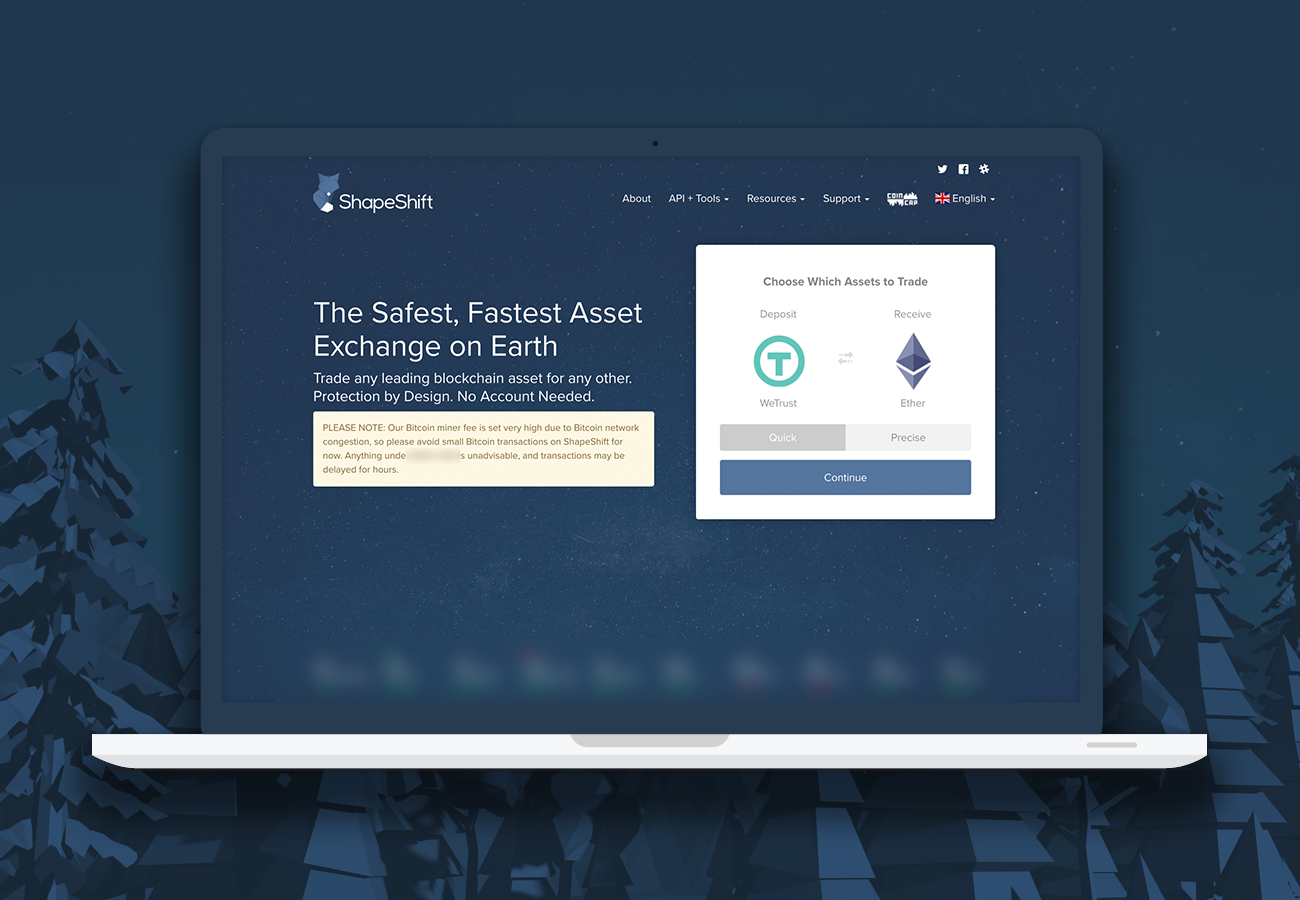 ShapeShift home page on a laptop, in a later skin than the 2015 launch. The exchange asks one thing: which assets to trade, with a Deposit asset on the left, a Receive asset on the right, a Quick or Precise toggle, and a Continue button. The headline reads The Safest, Fastest Asset Exchange on Earth, and under it, Protection by Design. No Account Needed. Below that sits a yellow notice saying the bitcoin miner fee is set very high because of network congestion, that small bitcoin transactions should be avoided for now, and that transactions may be delayed for hours. A price ticker runs across the bottom of the screen, blurred here. The redacted amount in the notice is blurred for the same reason.